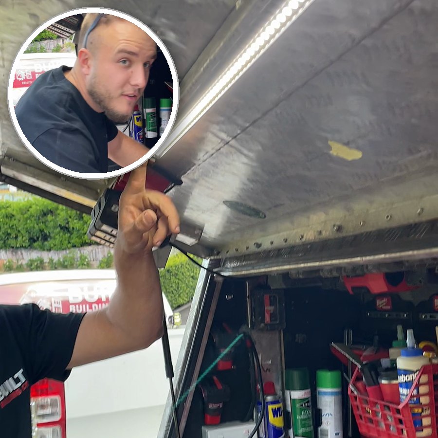 A worker pressing a LockLite bar up under his truck toolbox lid