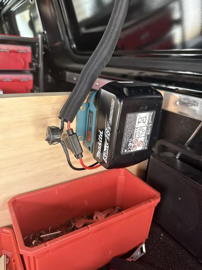 LockLite adapter with a Makita tool battery installed